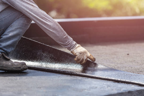 Professional Basement Waterproofing technician working in Freehold, NJ